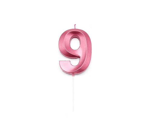 Vela numero 9 con relieve fucsia