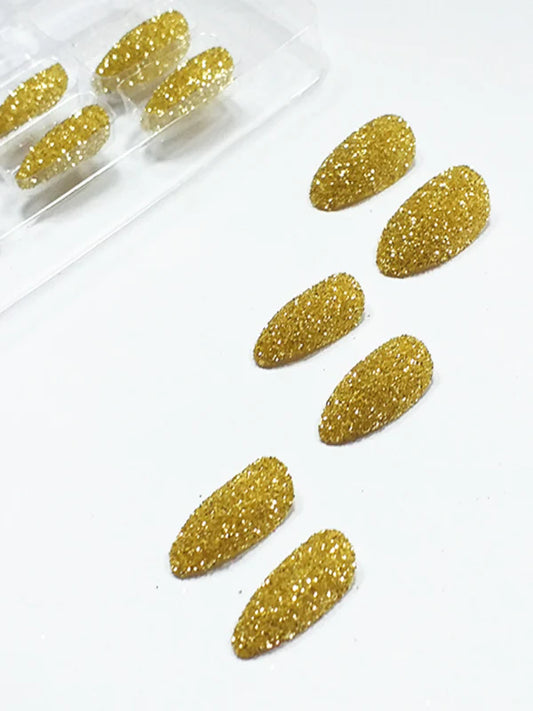 Uñas postizas glitter dorado